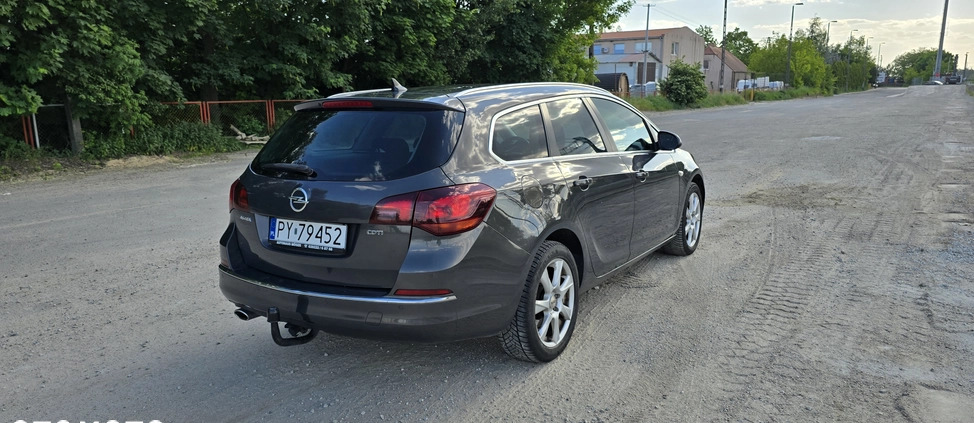 Opel Astra cena 25500 przebieg: 239000, rok produkcji 2014 z Poznań małe 277